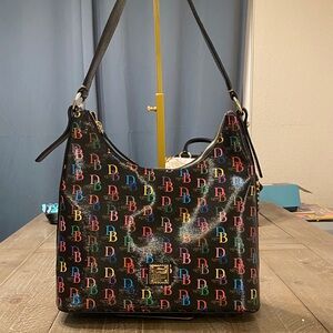 Dooney & Bourke Black Multicolor Logo Shoulder Bag comes with wallet.